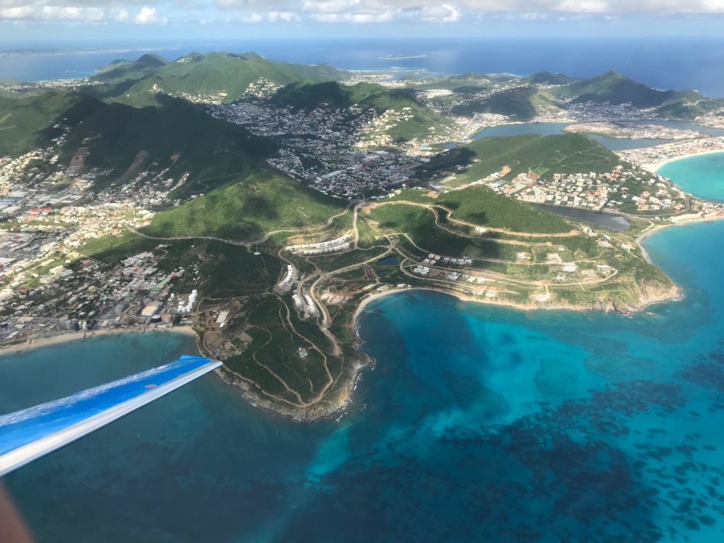 PlaneSense PC-24 flying over St. Maarten.